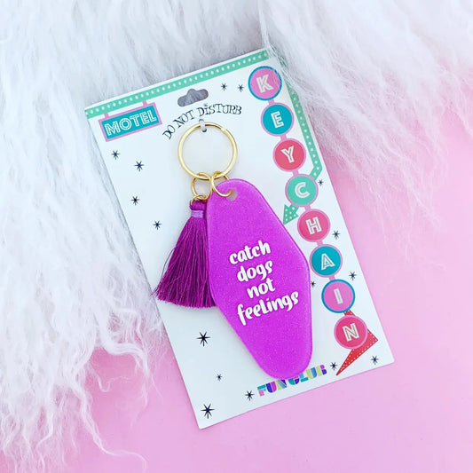 "catch dogs not feelings" key chain by fun club
